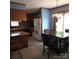 Inviting dining area featuring a decorative chandelier, natural lighting and views of the adjacent kitchen at 600 Colby Cir, Salisbury, NC 28147