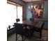 Charming dining room with a decorative chandelier, artwork, and natural lighting at 600 Colby Cir, Salisbury, NC 28147