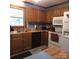 Efficient kitchen featuring stainless appliances, durable tile floors, and blue accent walls at 600 Colby Cir, Salisbury, NC 28147