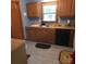 Functional kitchen featuring classic wood cabinets, a stainless steel sink and ample countertop space at 600 Colby Cir, Salisbury, NC 28147