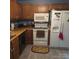 Well-lit kitchen featuring stainless steel appliances, wood cabinets and backsplash with durable flooring at 600 Colby Cir, Salisbury, NC 28147