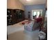 Inviting living room featuring cozy seating, built-in shelving and french doors to a back patio at 600 Colby Cir, Salisbury, NC 28147