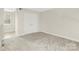 Upstairs bedroom with neutral carpet and a double-door closet at 6101 Heath Ridge Ct, Charlotte, NC 28210