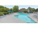 Inviting outdoor pool area with plenty of lounge chairs and tables for relaxation at 6101 Heath Ridge Ct, Charlotte, NC 28210