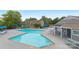 Community pool with plenty of chairs, tables, and a shaded area at 6101 Heath Ridge Ct, Charlotte, NC 28210