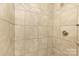 Close-up of the beautifully tiled walk-in shower featuring sleek design at 6101 Heath Ridge Ct, Charlotte, NC 28210