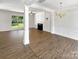 Bright living room with fireplace and lots of natural light at 6413 Fillian Ln, Charlotte, NC 28269