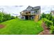 Large, well-maintained backyard, patio and upper deck with stairs to the grass at 7026 Wyngate Pl, Lancaster, SC 29720