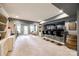 Finished basement with bar area, seating, and ample space for entertainment at 7026 Wyngate Pl, Lancaster, SC 29720