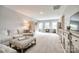 Spacious living room with ample natural light, plush carpeting, and stylish furnishings at 7026 Wyngate Pl, Lancaster, SC 29720