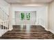 Bright and airy loft area with hardwood floors and large windows at 7609 Holly Grove Ct, Charlotte, NC 28227