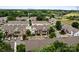 Aerial view of townhouse community with manicured lawns and ample parking at 7943 Mariners Pointe Cir, Denver, NC 28037