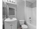 A standard bathroom with a vanity, toilet, and bathtub-shower combination at 7943 Mariners Pointe Cir, Denver, NC 28037