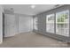 Bright bedroom includes large closet and many windows allowing for great natural light at 7943 Mariners Pointe Cir, Denver, NC 28037