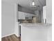 Kitchen with white cabinets, granite countertops, and stainless steel appliances at 7943 Mariners Pointe Cir, Denver, NC 28037