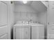 Convenient laundry room with modern washer and dryer units at 7943 Mariners Pointe Cir, Denver, NC 28037
