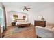 Large main bedroom features vaulted ceiling, hardwood floors, neutral colors, and ample light at 829 Sedgefield Rd, Charlotte, NC 28209