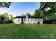 Large, level backyard offers space for recreation and outdoor enjoyment at 901 Echo Glen Rd, Charlotte, NC 28213