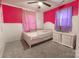 Colorful bedroom with bright walls, light carpet, and neutral furniture at 901 Echo Glen Rd, Charlotte, NC 28213