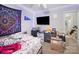 Bedroom featuring a TV and string lights on the ceiling at 1004 E 8Th Ave, Gastonia, NC 28054