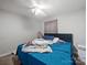 Bedroom featuring a blue bed and natural light from a window at 1004 E 8Th Ave, Gastonia, NC 28054
