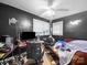 Bedroom with a computer and dark walls at 1004 E 8Th Ave, Gastonia, NC 28054