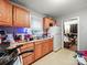 Functional kitchen with essential appliances and ample countertop space for meal preparation at 1004 E 8Th Ave, Gastonia, NC 28054