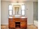 This updated bathroom features a wood vanity and large basin sink at 1038 Gold Mine Dr, Catawba, NC 28609
