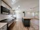 A bright kitchen features stainless appliances, gray cabinets, and a butcher block island at 1038 Gold Mine Dr, Catawba, NC 28609