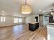 A spacious living room with an island bar and access to the front door at 1038 Gold Mine Dr, Catawba, NC 28609