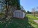Metal storage building with double doors, adjacent to trees and greenery at 1038 Gold Mine Dr, Catawba, NC 28609