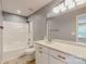 Bathroom featuring modern fixtures, a bathtub, and a vanity with drawers and mirror at 108 Devynne Ct, Salisbury, NC 28146