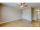 Bedroom featuring a ceiling fan, and a closet for ample storage space at 108 Devynne Ct, Salisbury, NC 28146