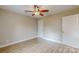 Bedroom featuring neutral walls, modern ceiling fan, and light hardwood flooring at 108 Devynne Ct, Salisbury, NC 28146