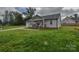 View of a charming single-story home with a well-manicured lawn, and an inviting front porch at 108 Devynne Ct, Salisbury, NC 28146
