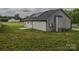 Exterior view of a house with white siding, a gray roof, and solar panels on the roof at 108 Devynne Ct, Salisbury, NC 28146