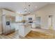Spacious kitchen features stainless appliances, granite countertops and a bright, airy layout at 108 Devynne Ct, Salisbury, NC 28146