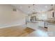 Bright kitchen features granite countertops, a kitchen island and stainless steel appliances at 108 Devynne Ct, Salisbury, NC 28146