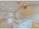 Kitchen view highlighting the open layout, island with granite countertops, and modern lighting at 108 Devynne Ct, Salisbury, NC 28146