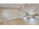 Open-concept living space with wood-look flooring, vaulted ceiling, and access to the kitchen area at 108 Devynne Ct, Salisbury, NC 28146