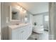 Bright bathroom with double sinks and a separate soaking tub, offering a spa-like experience at 110 Crescent Heights Dr, Salisbury, NC 28146