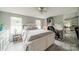 Bright bedroom with ample natural light, complemented by gray walls and white furniture, creating a serene atmosphere at 110 Crescent Heights Dr, Salisbury, NC 28146