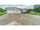 Spacious driveway leading to a large garage and house with basketball hoop. Ready for fun! at 110 Crescent Heights Dr, Salisbury, NC 28146