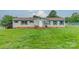 Charming single-story home featuring a well-maintained lawn, complemented by green shutters and a welcoming front porch at 110 Crescent Heights Dr, Salisbury, NC 28146