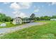 Spacious yard with a storage shed and vehicle parking, offering ample outdoor space and utility at 110 Crescent Heights Dr, Salisbury, NC 28146