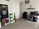Functional office space with a desk, computer setup, and storage, suitable for work or hobbies at 114 Wayne Ave, Kannapolis, NC 28081