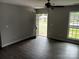 Inviting living room with fresh paint, laminate floors, and a bright view of the front entrance at 12 Watts St, York, SC 29745