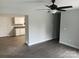 Open-concept design with laminate floors, connecting the living area and kitchen at 12 Watts St, York, SC 29745