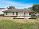 Home's backyard with a small patio at 12307 Poplar Forest Dr, Charlotte, NC 28278