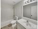 Bright bathroom with a shower-tub combination and vanity with mirror at 12307 Poplar Forest Dr, Charlotte, NC 28278